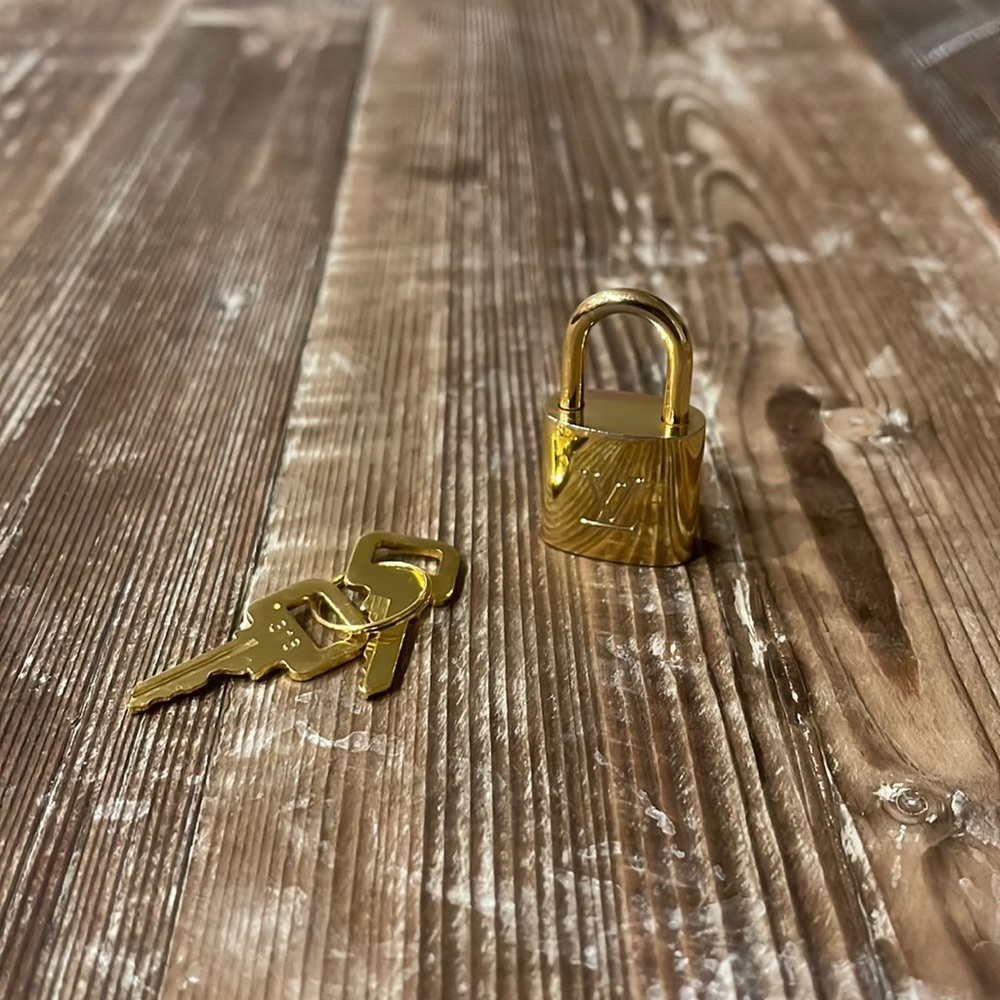 Louis Vuitton Gold Lock and Key